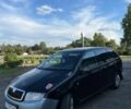 Черный Шкода Фабия, объемом двигателя 1.2 л и пробегом 210 тыс. км за 1500 $, фото 1 на Automoto.ua