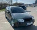 Черный Шкода Фабия, объемом двигателя 1.4 л и пробегом 186 тыс. км за 4200 $, фото 1 на Automoto.ua