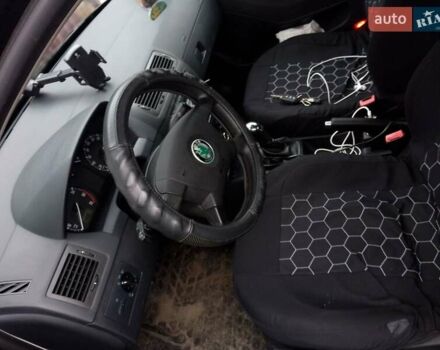 Черный Шкода Фабия, объемом двигателя 1.39 л и пробегом 220 тыс. км за 4800 $, фото 13 на Automoto.ua