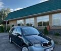 Черный Шкода Фабия, объемом двигателя 1.2 л и пробегом 210 тыс. км за 1500 $, фото 1 на Automoto.ua