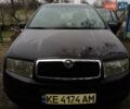 Черный Шкода Фабия, объемом двигателя 1.39 л и пробегом 220 тыс. км за 4800 $, фото 1 на Automoto.ua