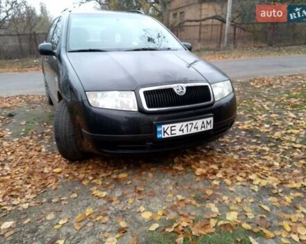 Черный Шкода Фабия, объемом двигателя 1.39 л и пробегом 220 тыс. км за 4800 $, фото 3 на Automoto.ua