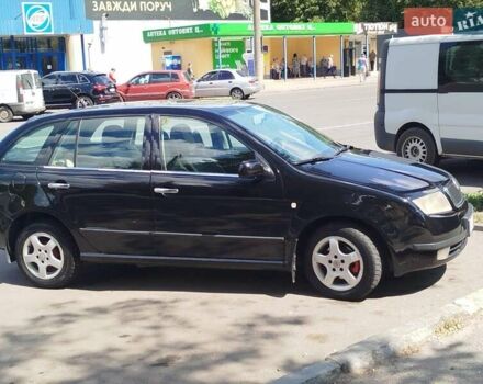 Черный Шкода Фабия, объемом двигателя 1.4 л и пробегом 213 тыс. км за 3999 $, фото 8 на Automoto.ua