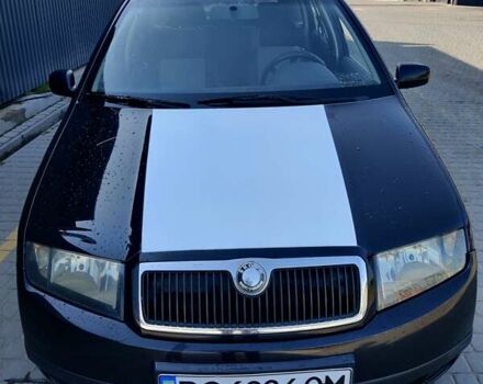 Черный Шкода Фабия, объемом двигателя 1.39 л и пробегом 248 тыс. км за 3500 $, фото 2 на Automoto.ua