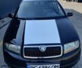 Черный Шкода Фабия, объемом двигателя 1.39 л и пробегом 248 тыс. км за 3500 $, фото 2 на Automoto.ua