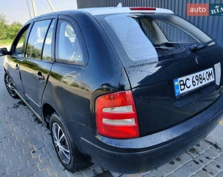 Черный Шкода Фабия, объемом двигателя 1.39 л и пробегом 248 тыс. км за 3500 $, фото 7 на Automoto.ua