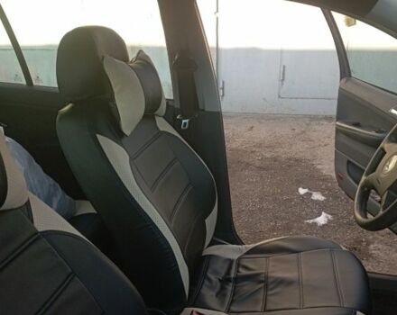 Черный Шкода Фабия, объемом двигателя 1.4 л и пробегом 213 тыс. км за 3900 $, фото 2 на Automoto.ua