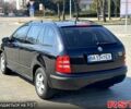 Черный Шкода Фабия, объемом двигателя 1.4 л и пробегом 237 тыс. км за 4200 $, фото 3 на Automoto.ua