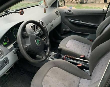 Черный Шкода Фабия, объемом двигателя 1.39 л и пробегом 264 тыс. км за 3600 $, фото 6 на Automoto.ua