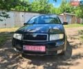 Черный Шкода Фабия, объемом двигателя 1.4 л и пробегом 215 тыс. км за 4550 $, фото 1 на Automoto.ua