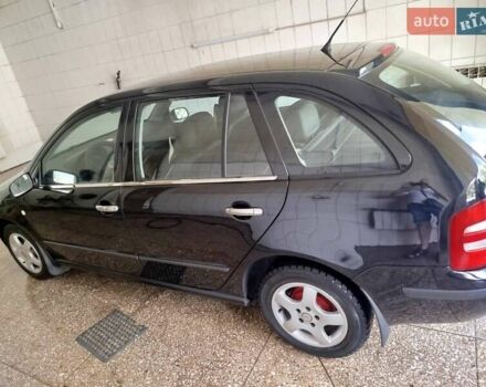 Черный Шкода Фабия, объемом двигателя 1.4 л и пробегом 213 тыс. км за 3999 $, фото 5 на Automoto.ua