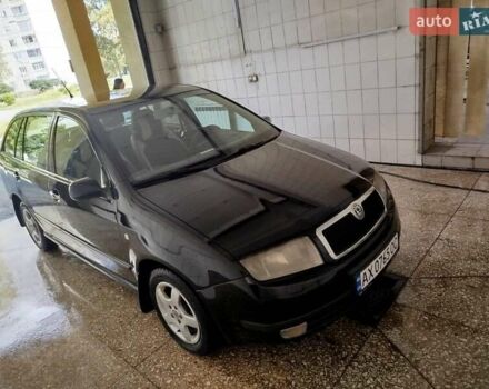 Черный Шкода Фабия, объемом двигателя 1.4 л и пробегом 213 тыс. км за 3999 $, фото 2 на Automoto.ua
