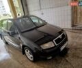Черный Шкода Фабия, объемом двигателя 1.4 л и пробегом 213 тыс. км за 3999 $, фото 2 на Automoto.ua