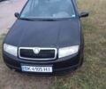 Черный Шкода Фабия, объемом двигателя 1.4 л и пробегом 486 тыс. км за 2100 $, фото 1 на Automoto.ua