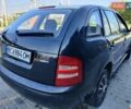Черный Шкода Фабия, объемом двигателя 1.39 л и пробегом 248 тыс. км за 3500 $, фото 6 на Automoto.ua