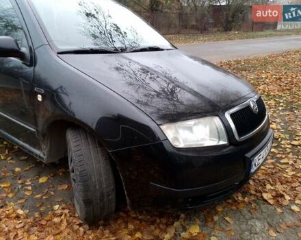 Черный Шкода Фабия, объемом двигателя 1.39 л и пробегом 220 тыс. км за 4800 $, фото 1 на Automoto.ua