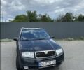 Черный Шкода Фабия, объемом двигателя 1.2 л и пробегом 350 тыс. км за 2800 $, фото 1 на Automoto.ua