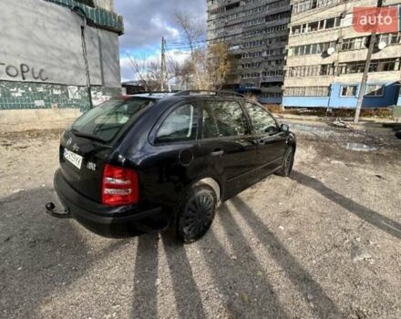 Черный Шкода Фабия, объемом двигателя 1.39 л и пробегом 220 тыс. км за 4800 $, фото 5 на Automoto.ua