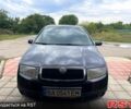 Черный Шкода Фабия, объемом двигателя 1.4 л и пробегом 186 тыс. км за 4100 $, фото 1 на Automoto.ua