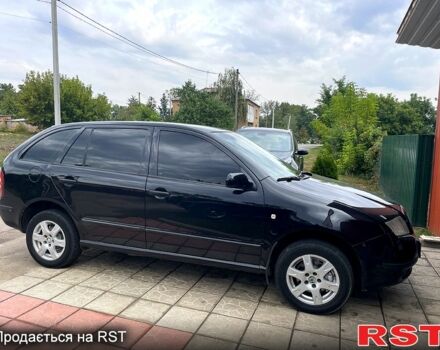 Черный Шкода Фабия, объемом двигателя 1.4 л и пробегом 186 тыс. км за 4100 $, фото 2 на Automoto.ua
