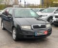 Черный Шкода Фабия, объемом двигателя 1.4 л и пробегом 308 тыс. км за 3390 $, фото 2 на Automoto.ua
