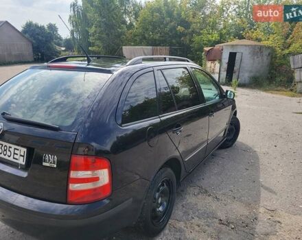 Черный Шкода Фабия, объемом двигателя 1.39 л и пробегом 265 тыс. км за 4350 $, фото 8 на Automoto.ua