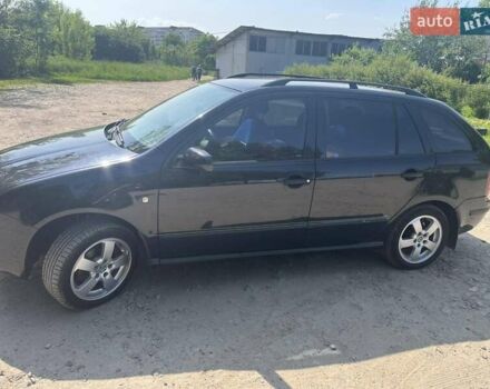 Черный Шкода Фабия, объемом двигателя 1.39 л и пробегом 226 тыс. км за 4600 $, фото 4 на Automoto.ua