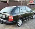 Черный Шкода Фабия, объемом двигателя 1.4 л и пробегом 225 тыс. км за 4800 $, фото 29 на Automoto.ua