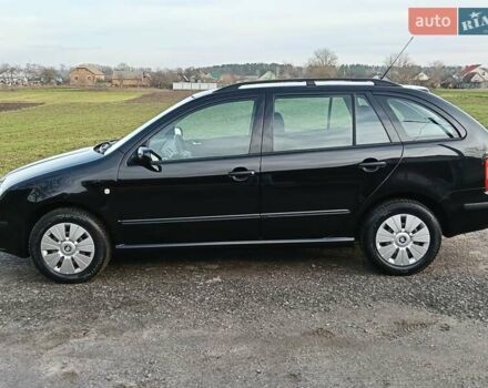 Черный Шкода Фабия, объемом двигателя 1.4 л и пробегом 225 тыс. км за 4800 $, фото 33 на Automoto.ua