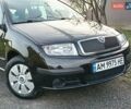 Черный Шкода Фабия, объемом двигателя 1.4 л и пробегом 225 тыс. км за 4800 $, фото 1 на Automoto.ua