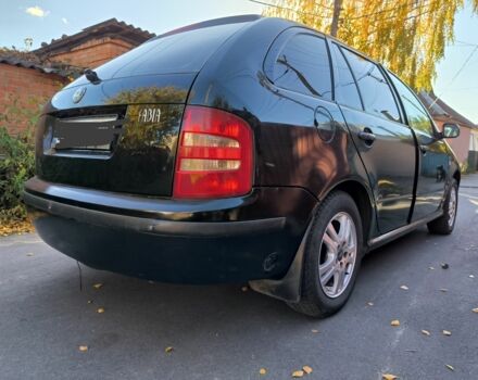 Черный Шкода Фабия, объемом двигателя 1.4 л и пробегом 309 тыс. км за 2900 $, фото 3 на Automoto.ua
