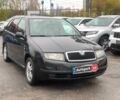 Черный Шкода Фабия, объемом двигателя 1.4 л и пробегом 308 тыс. км за 3390 $, фото 2 на Automoto.ua