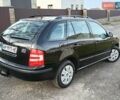 Черный Шкода Фабия, объемом двигателя 1.4 л и пробегом 225 тыс. км за 4800 $, фото 9 на Automoto.ua