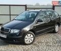 Черный Шкода Фабия, объемом двигателя 1.4 л и пробегом 225 тыс. км за 4800 $, фото 1 на Automoto.ua
