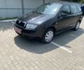 Черный Шкода Фабия, объемом двигателя 1.4 л и пробегом 219 тыс. км за 3850 $, фото 1 на Automoto.ua