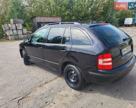 Черный Шкода Фабия, объемом двигателя 1.39 л и пробегом 265 тыс. км за 4350 $, фото 5 на Automoto.ua