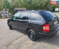 Черный Шкода Фабия, объемом двигателя 1.39 л и пробегом 265 тыс. км за 4350 $, фото 5 на Automoto.ua