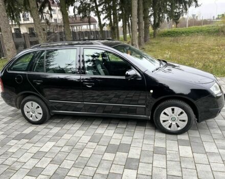 Черный Шкода Фабия, объемом двигателя 1.4 л и пробегом 230 тыс. км за 3999 $, фото 5 на Automoto.ua