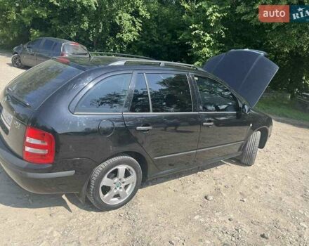 Черный Шкода Фабия, объемом двигателя 1.39 л и пробегом 226 тыс. км за 4600 $, фото 7 на Automoto.ua