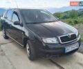 Черный Шкода Фабия, объемом двигателя 1.2 л и пробегом 235 тыс. км за 3200 $, фото 1 на Automoto.ua