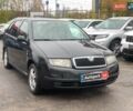 Черный Шкода Фабия, объемом двигателя 1.4 л и пробегом 308 тыс. км за 3390 $, фото 2 на Automoto.ua