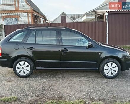 Черный Шкода Фабия, объемом двигателя 1.4 л и пробегом 225 тыс. км за 4800 $, фото 30 на Automoto.ua