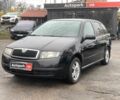 Черный Шкода Фабия, объемом двигателя 1.4 л и пробегом 308 тыс. км за 3390 $, фото 1 на Automoto.ua