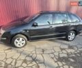 Черный Шкода Фабия, объемом двигателя 1.39 л и пробегом 249 тыс. км за 3700 $, фото 1 на Automoto.ua