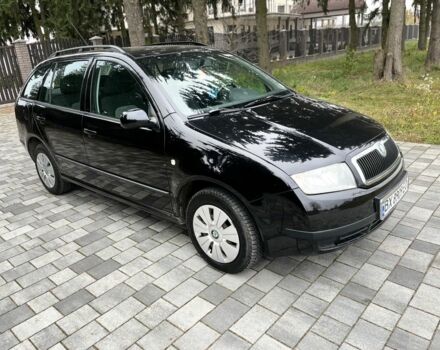 Черный Шкода Фабия, объемом двигателя 1.4 л и пробегом 230 тыс. км за 3999 $, фото 4 на Automoto.ua