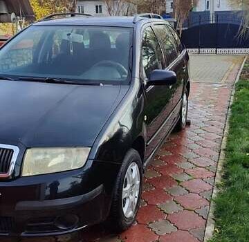 Черный Шкода Фабия, объемом двигателя 1.4 л и пробегом 387 тыс. км за 3500 $, фото 2 на Automoto.ua