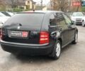 Черный Шкода Фабия, объемом двигателя 1.4 л и пробегом 308 тыс. км за 3390 $, фото 4 на Automoto.ua