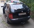 Черный Шкода Фабия, объемом двигателя 1.4 л и пробегом 312 тыс. км за 3100 $, фото 1 на Automoto.ua