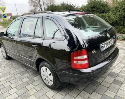 Черный Шкода Фабия, объемом двигателя 1.4 л и пробегом 230 тыс. км за 3999 $, фото 11 на Automoto.ua