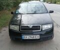 Черный Шкода Фабия, объемом двигателя 1.39 л и пробегом 214 тыс. км за 3200 $, фото 1 на Automoto.ua